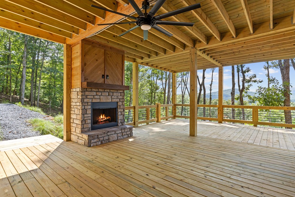 394 Mountain Trace Cherry Log, GA 30522 - Photo 59 of 70 a view of livingroom with wooden floor and a fireplace