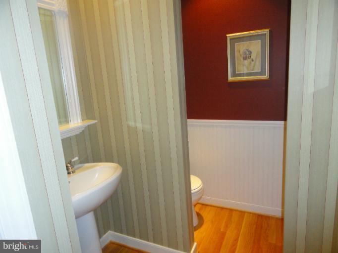 723 Sunpoint Road Davidsonville, MD 21035 - Photo 25 of 30 View of half bath on main level