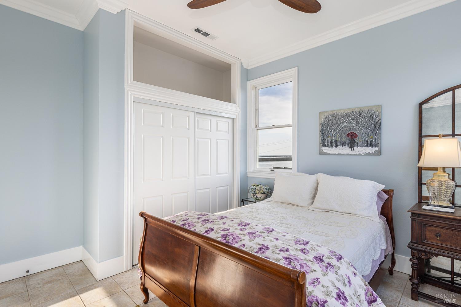 1730 Milton Road Napa, CA 94559 - Photo 62 of 77 a bedroom with a bed and a window