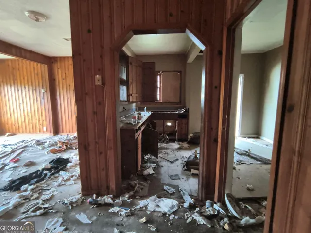 a view of a livingroom with furniture and front door