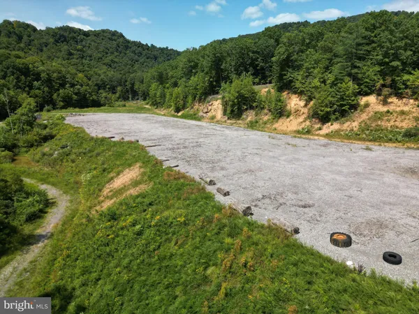 a view of a backyard of a house