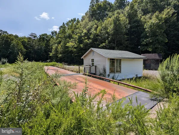 a house with trees in the background