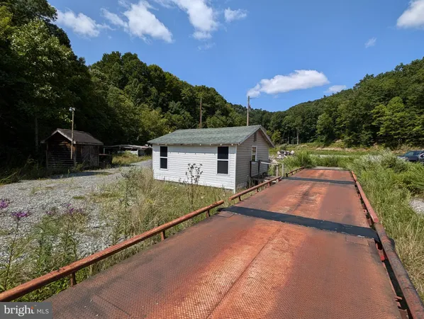 a house view with a backyard space