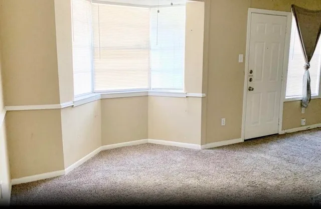 an empty room with a window