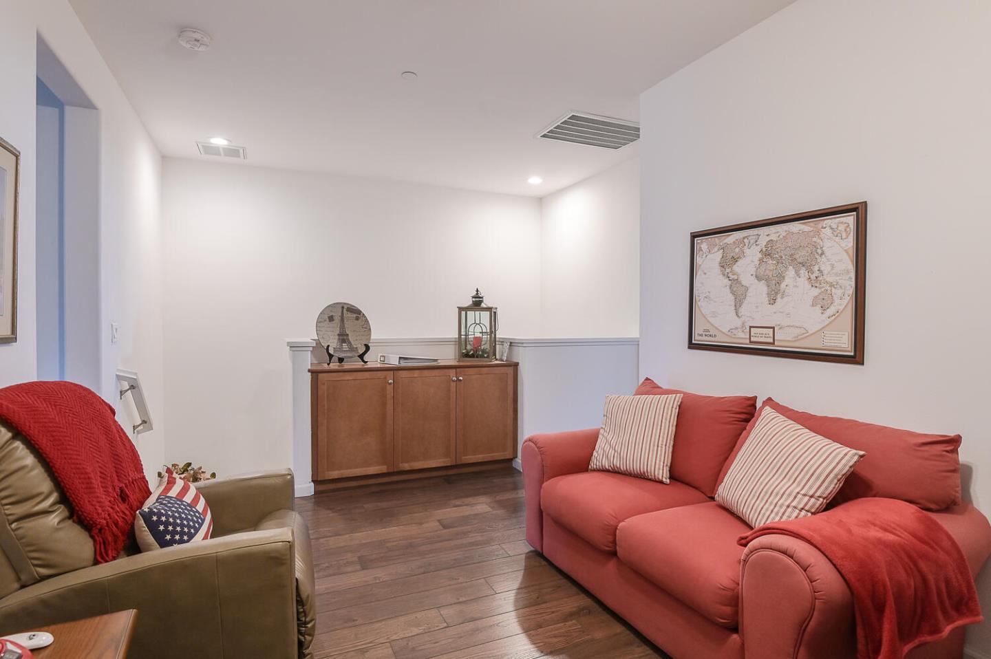 124 Larkspur Loop Morgan Hill, CA 95037 - Photo 13 of 26 a living room with furniture and a wooden floor
