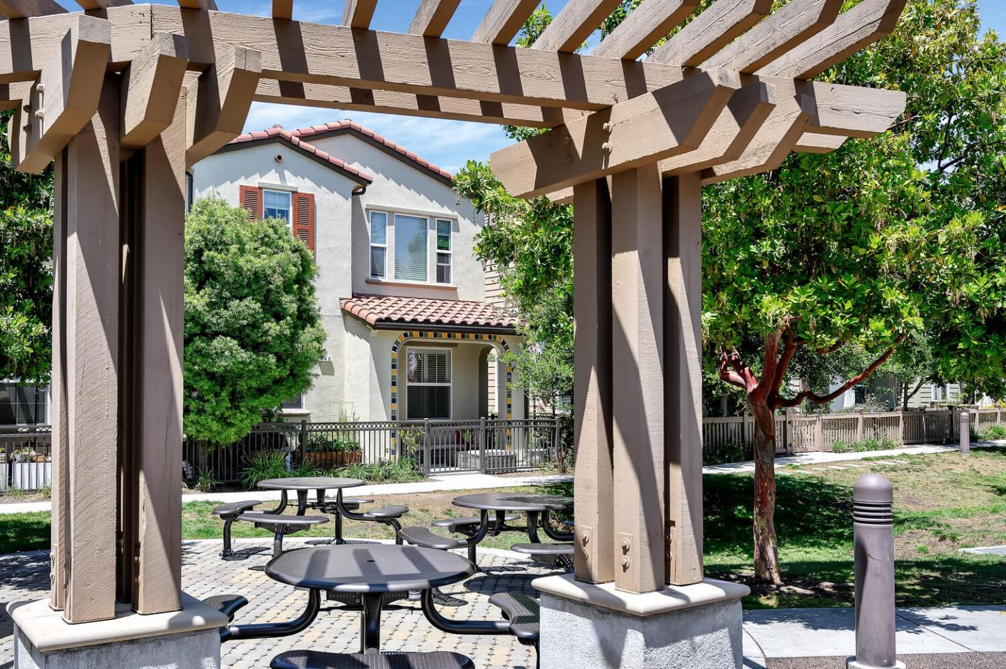 124 Larkspur Loop Morgan Hill, CA 95037 - Photo 25 of 26 a view of backyard with outdoor seating and plants