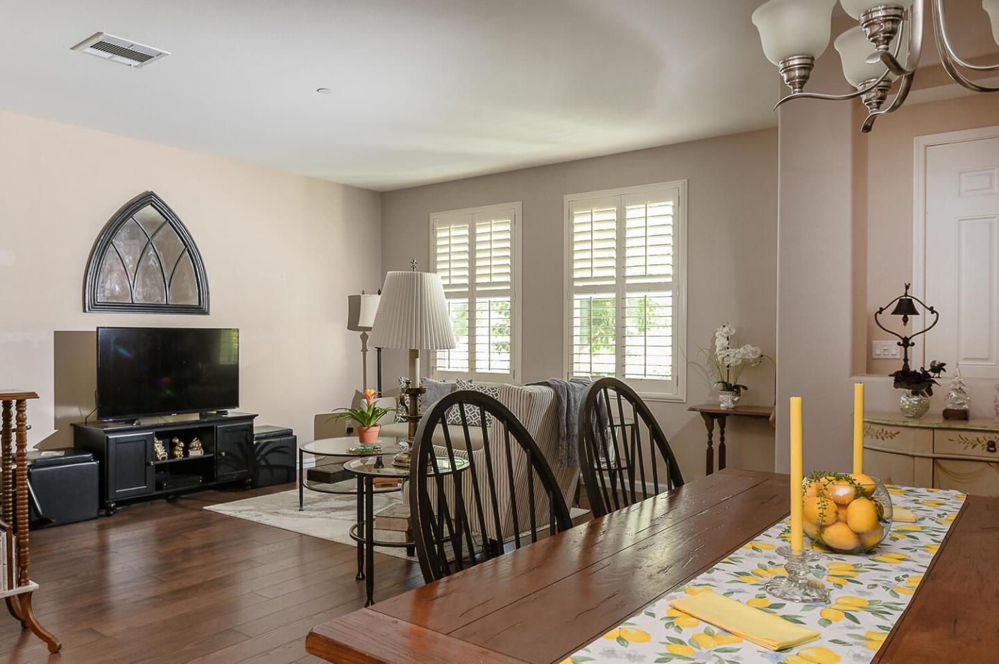124 Larkspur Loop Morgan Hill, CA 95037 - Photo 5 of 26 a living room with furniture and a flat screen tv