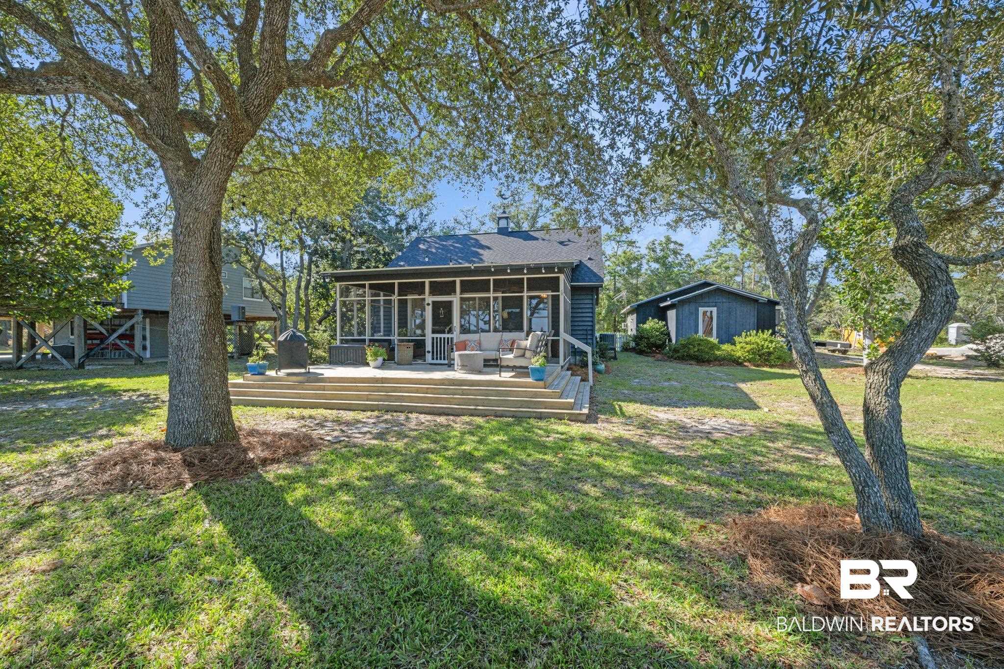 7646 Spring Branch Road Elberta, AL 36530 - Photo 35 of 85 Back of house with a yard and a wooden deck