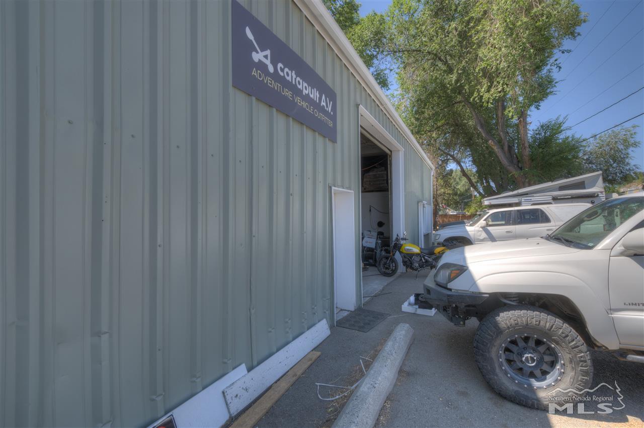 2160 Dickerson Road Reno, NV 89503 - Photo 32 of 35 a view of a house with a bed and a car parked
