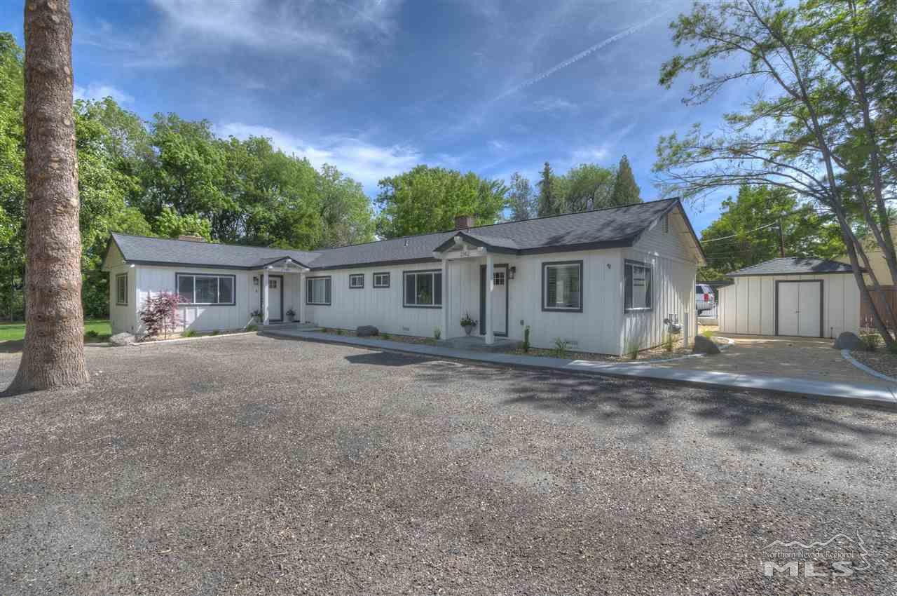 2160 Dickerson Road Reno, NV 89503 - Photo 4 of 35 a view of a house with a yard and a large tree