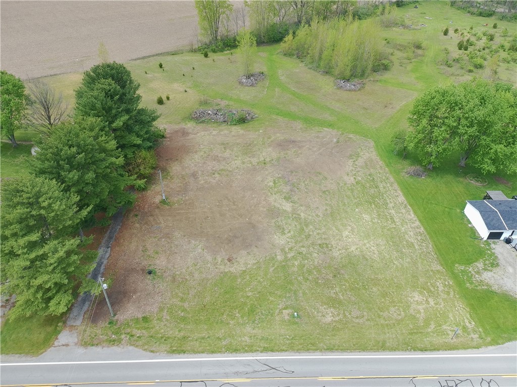 5400 Runkle Road St. Paris, OH 43072 - Photo 3 of 16 Expansive lot ready for development, featuring natural landscaping and easy road access.
