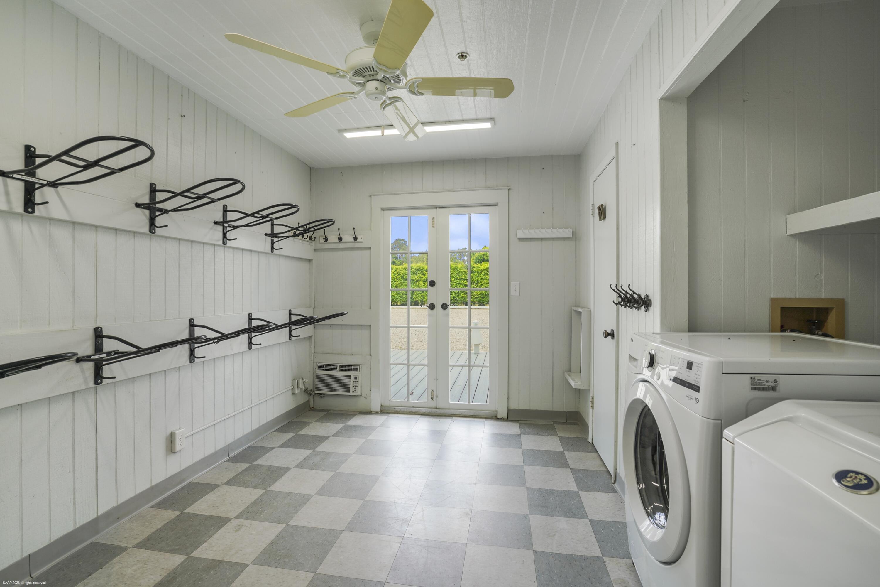 2740 Buck Ridge Trail Loxahatchee, FL 33470 - Photo 59 of 70 Tack room with laundry