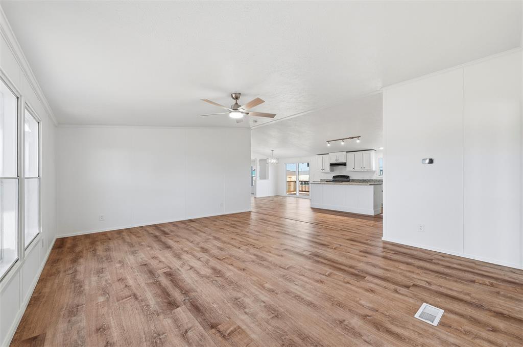 237 Quarterhorse Road Waxahachie, TX 75165 - Photo 18 of 38 a view of empty room with wooden floor