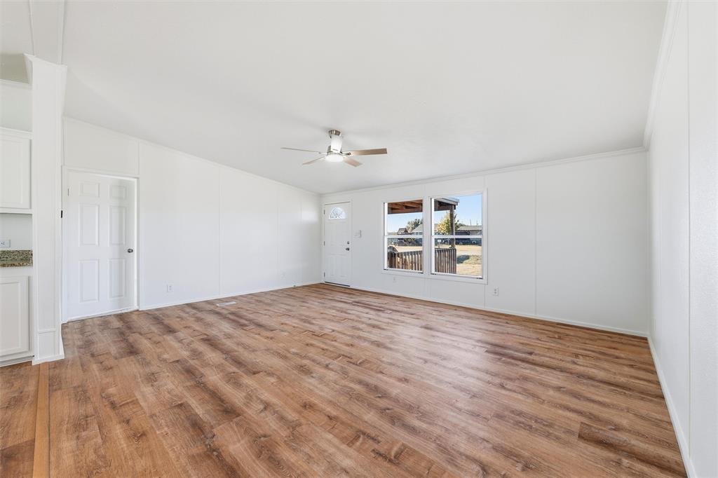 237 Quarterhorse Road Waxahachie, TX 75165 - Photo 19 of 38 a view of empty room with wooden floor
