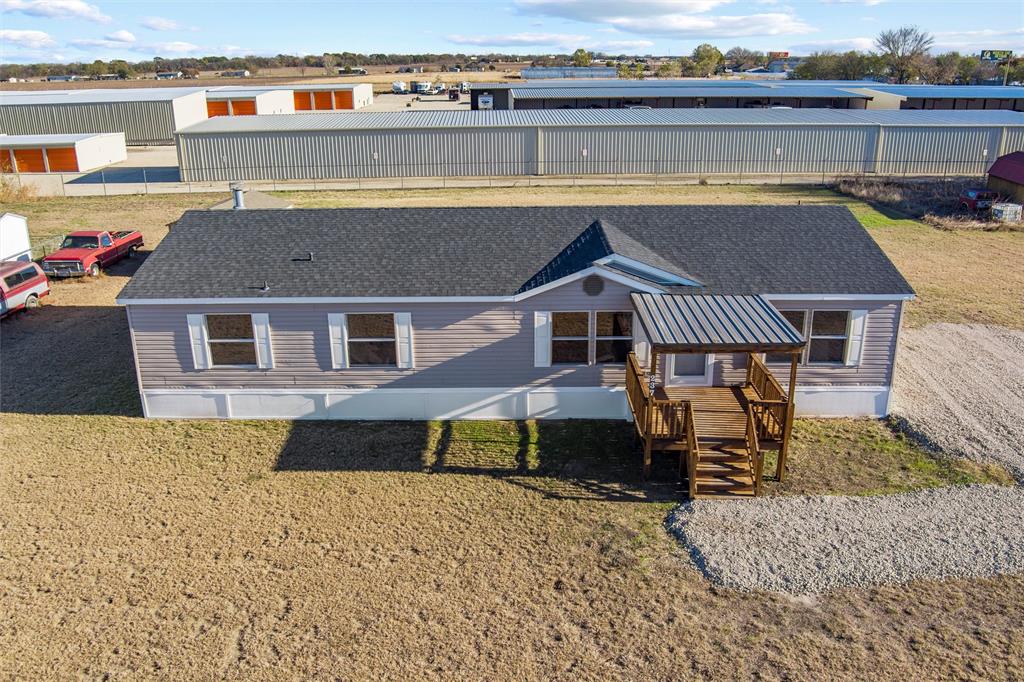 237 Quarterhorse Road Waxahachie, TX 75165 - Photo 2 of 38 a aerial view of a house with swimming pool and sitting area