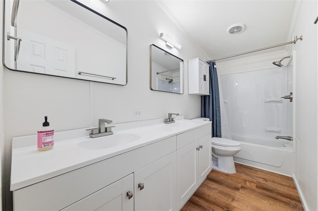 237 Quarterhorse Road Waxahachie, TX 75165 - Photo 30 of 38 a bathroom with a sink toilet and shower