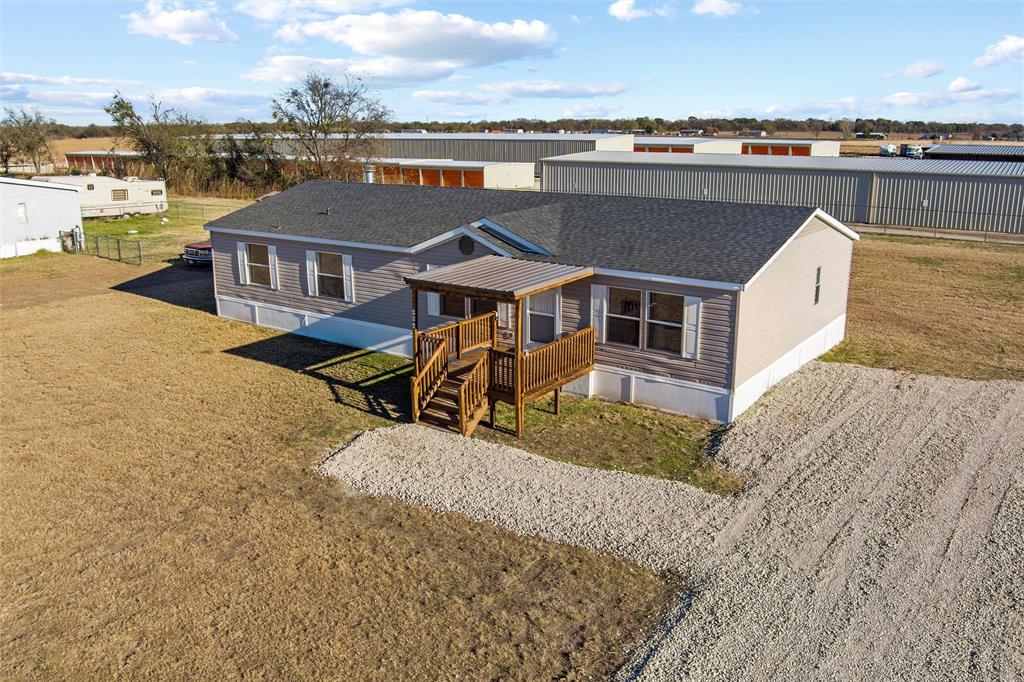 237 Quarterhorse Road Waxahachie, TX 75165 - Photo 5 of 38 an aerial view of a house with a ocean view