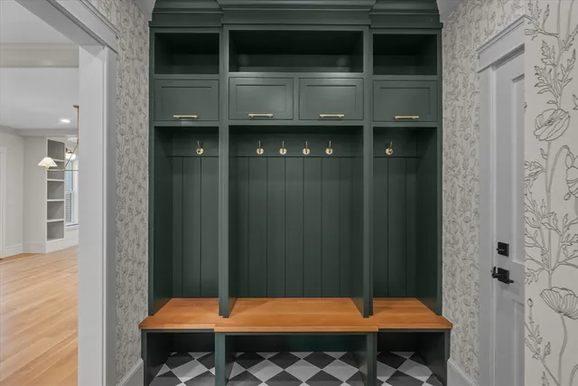 a kitchen with a table and chairs