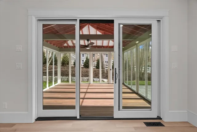 a view of a door and a window