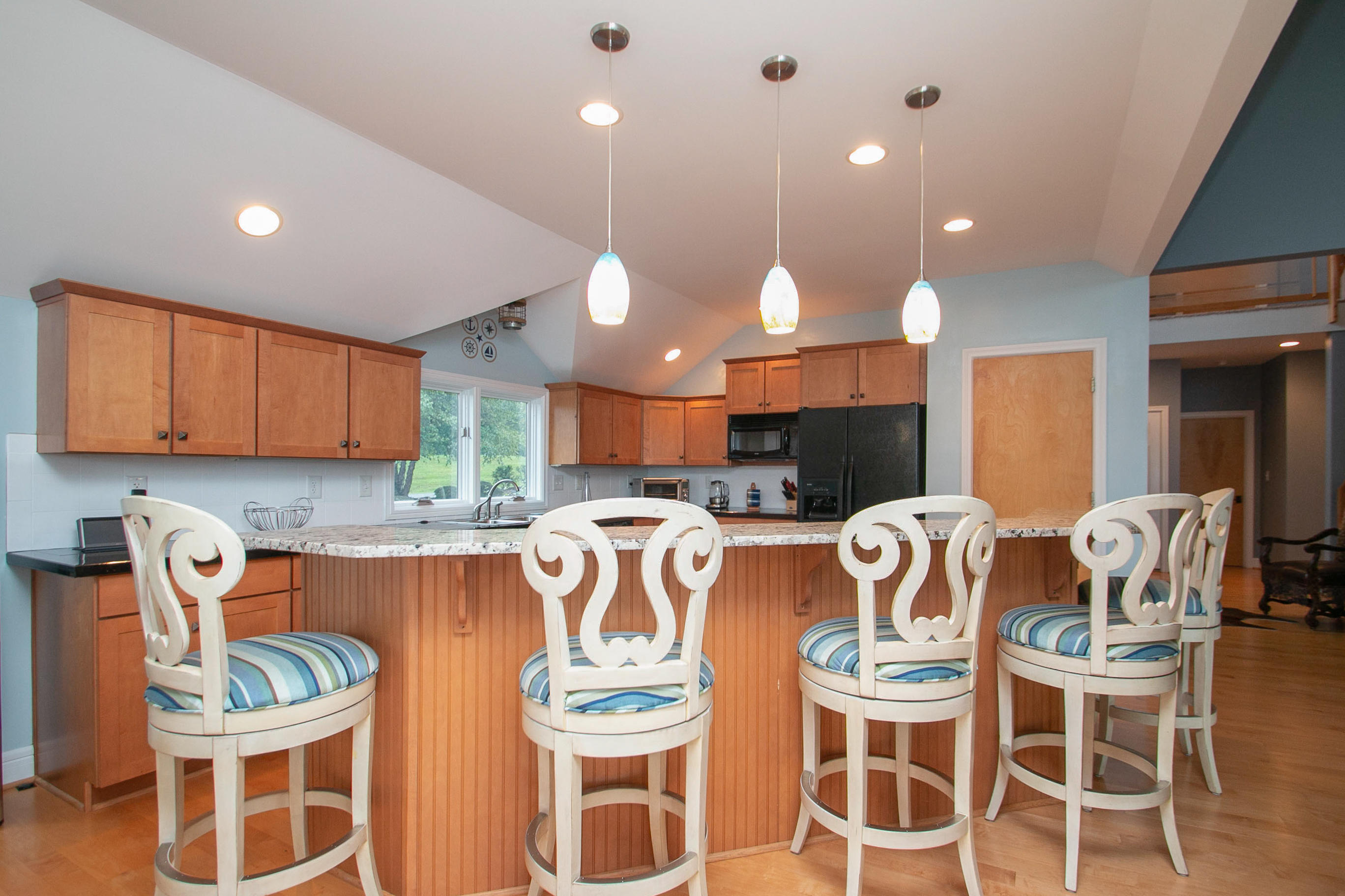 41 Fantasy Point Circle Union Hall, VA 24176 - Photo 14 of 67 a kitchen with a dining table and chairs