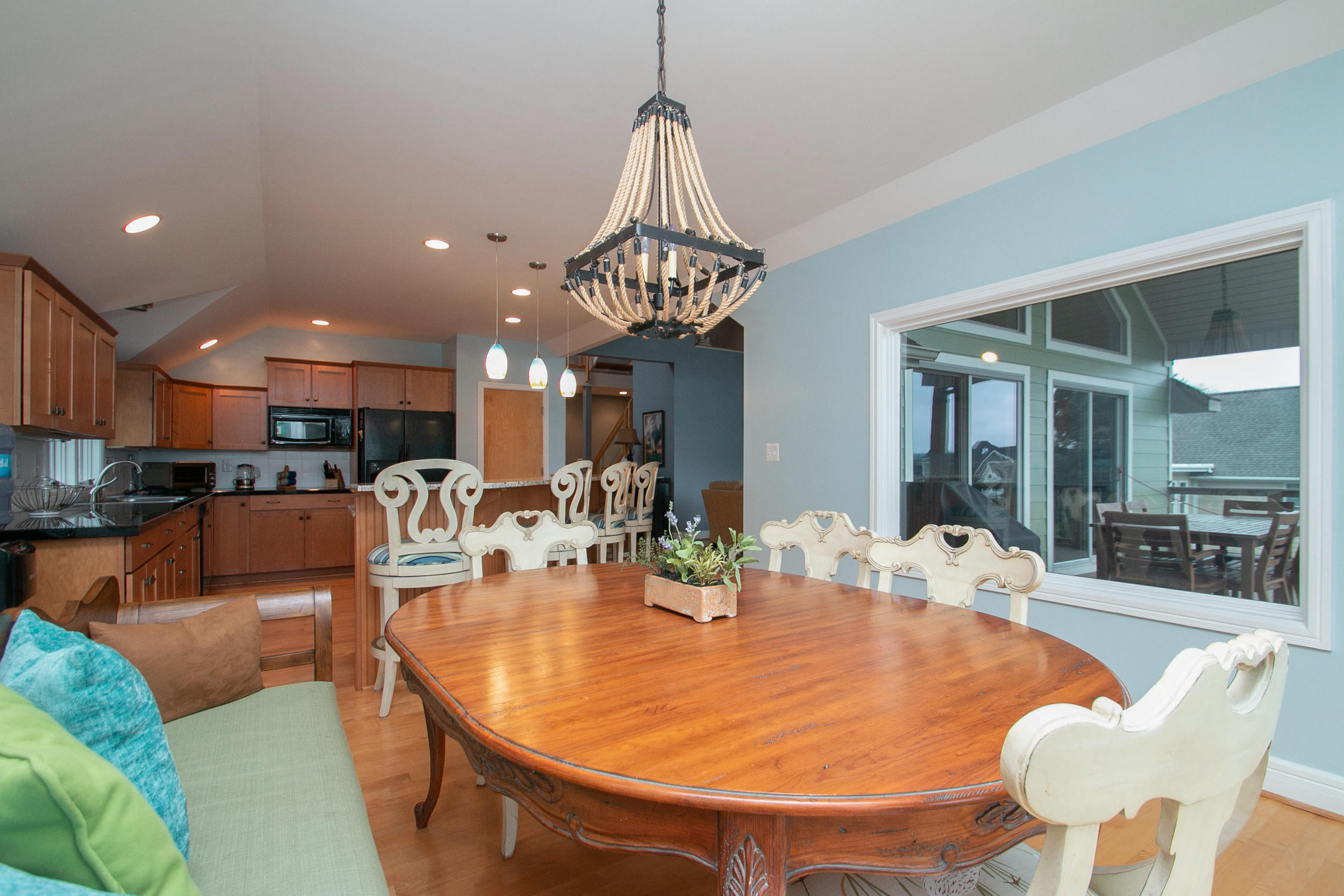 41 Fantasy Point Circle Union Hall, VA 24176 - Photo 21 of 67 a dining room with furniture a chandelier and wooden floor