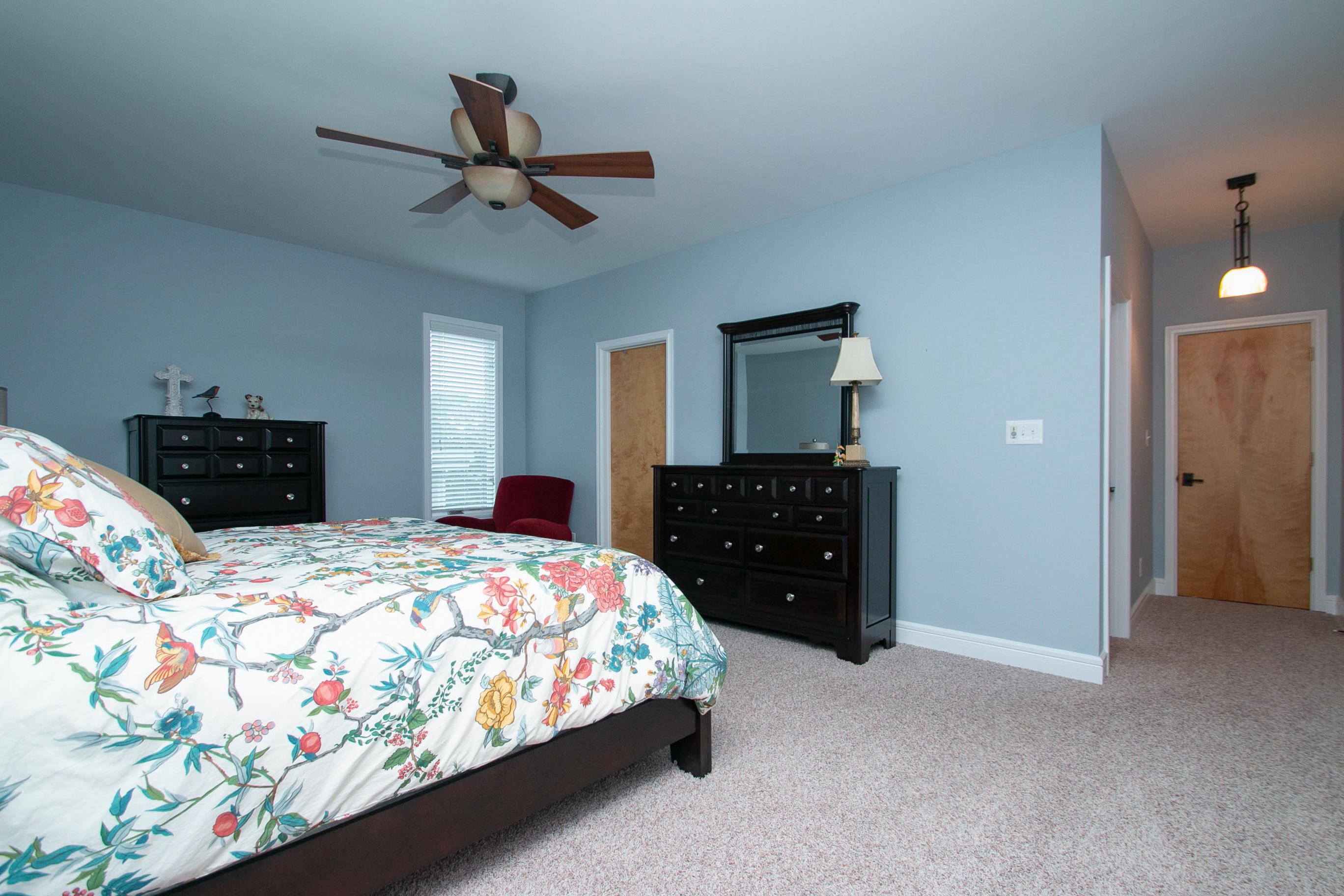 41 Fantasy Point Circle Union Hall, VA 24176 - Photo 23 of 67 a bedroom with a bed and dresser with mirror
