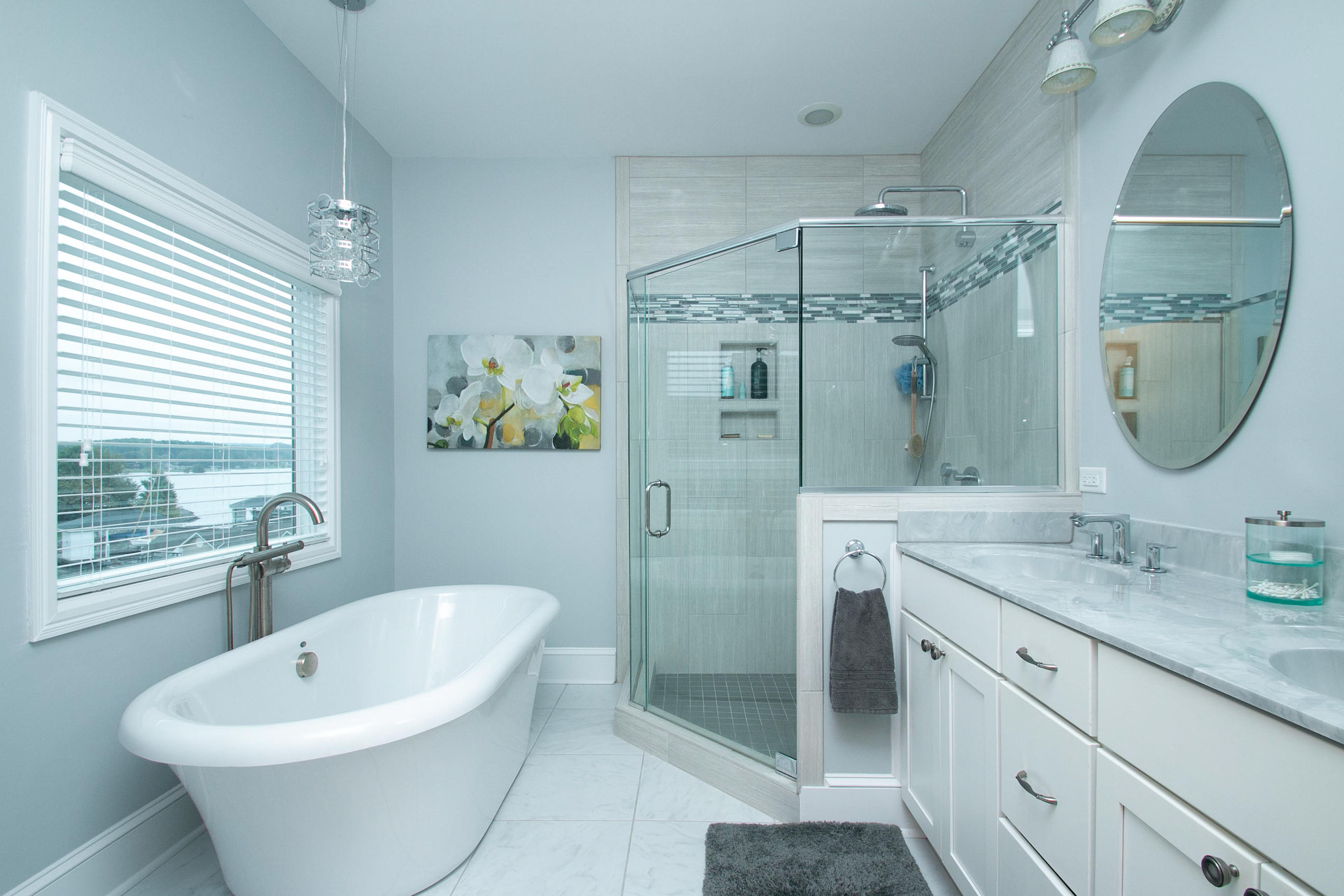 41 Fantasy Point Circle Union Hall, VA 24176 - Photo 24 of 67 a spacious bathroom with a double vanity sink a mirror a bathtub and shower