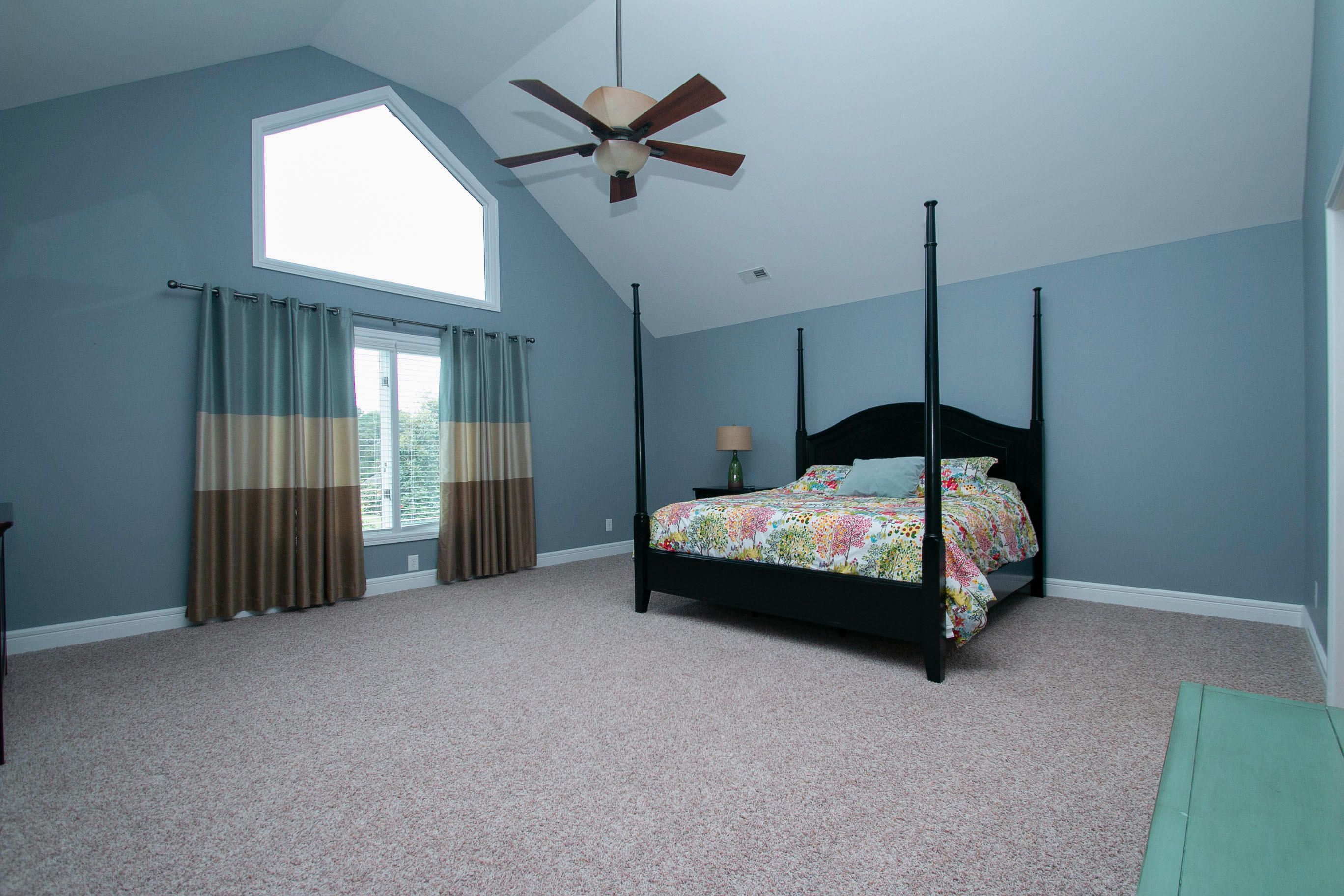41 Fantasy Point Circle Union Hall, VA 24176 - Photo 32 of 67 a bedroom with a bed a chandelier and a window