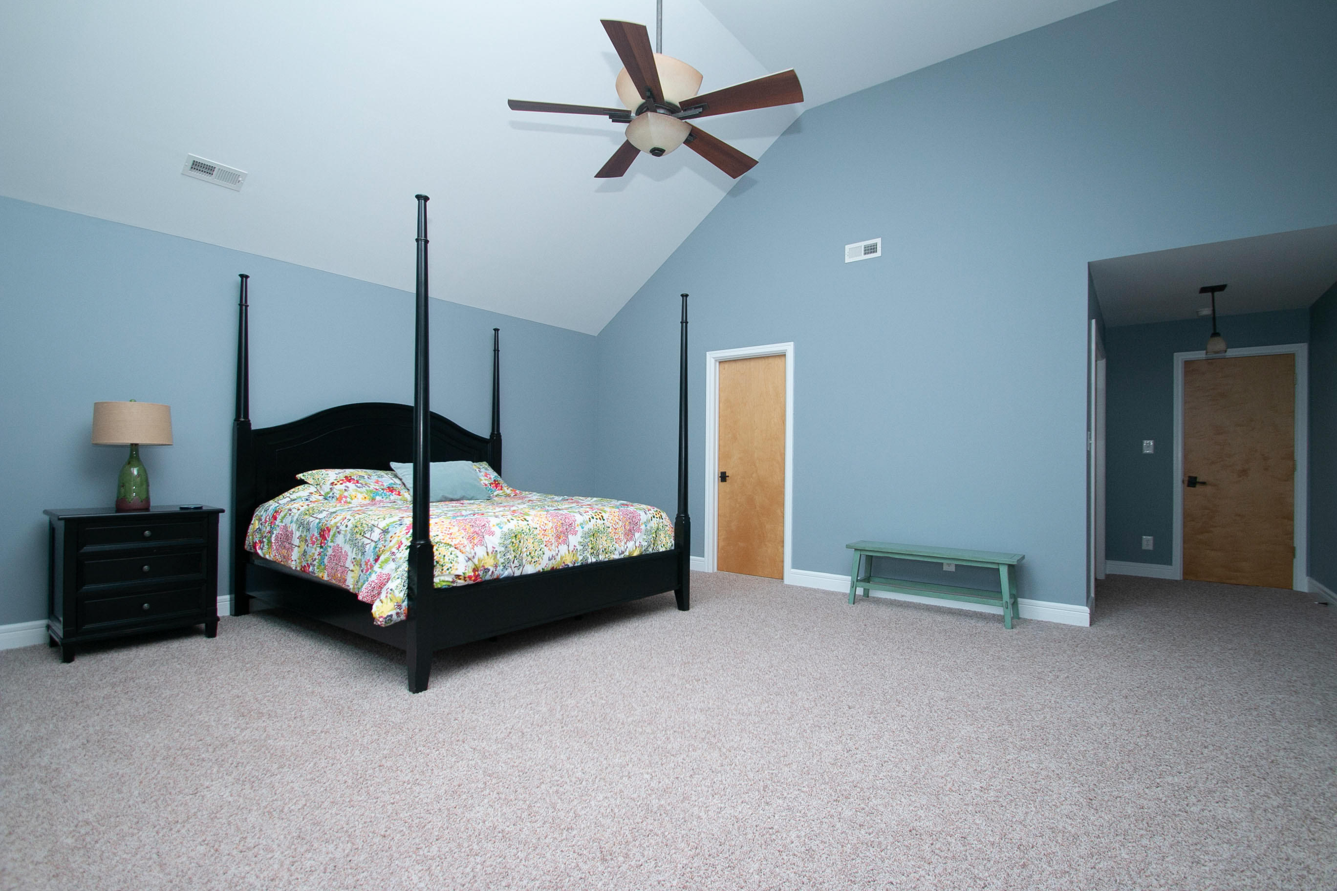 41 Fantasy Point Circle Union Hall, VA 24176 - Photo 33 of 67 a bedroom with a bed and a chandelier