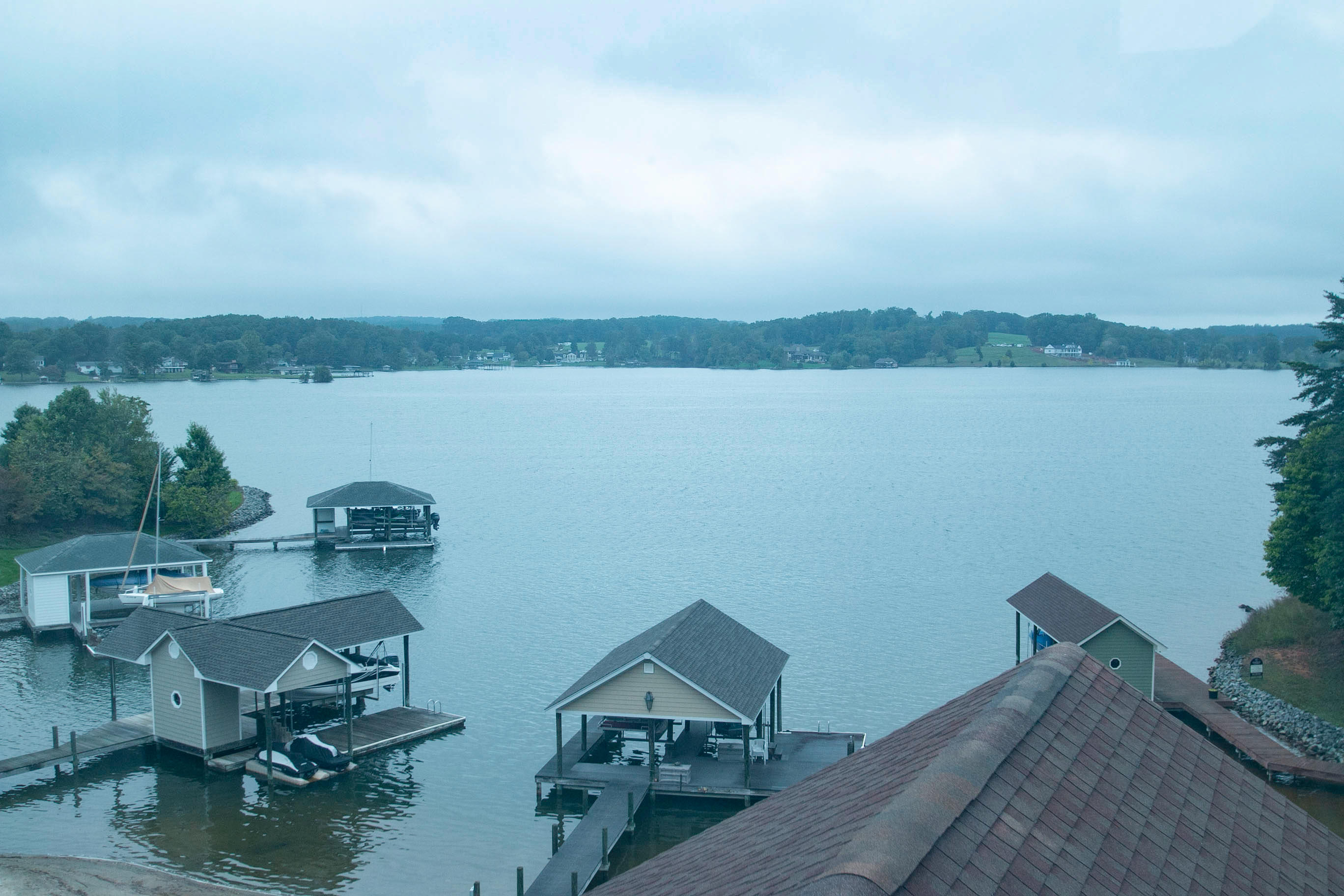 41 Fantasy Point Circle Union Hall, VA 24176 - Photo 46 of 67 a view of a lake with couches and wooden floor