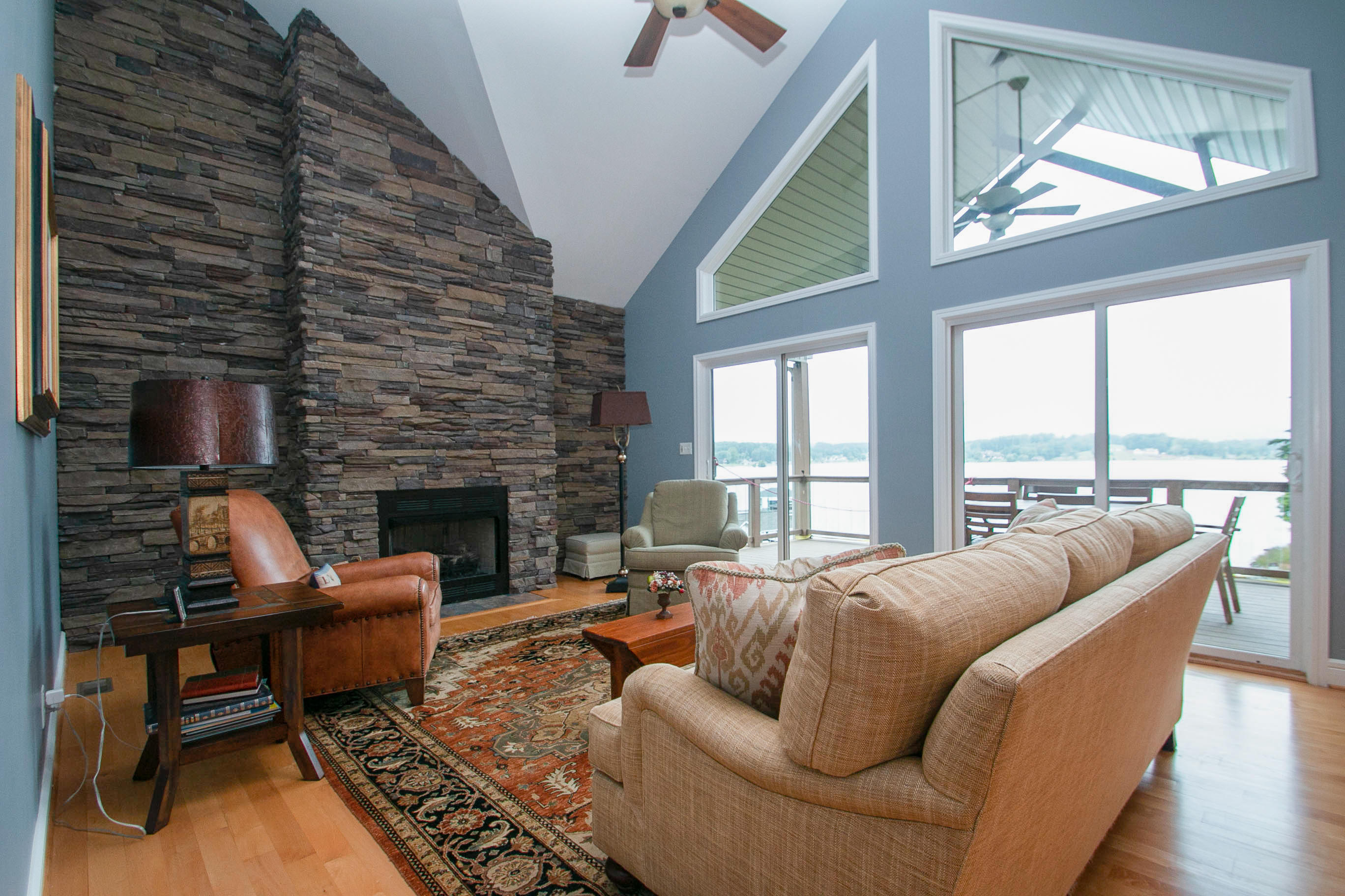41 Fantasy Point Circle Union Hall, VA 24176 - Photo 8 of 67 a living room with furniture fireplace and a floor to ceiling window