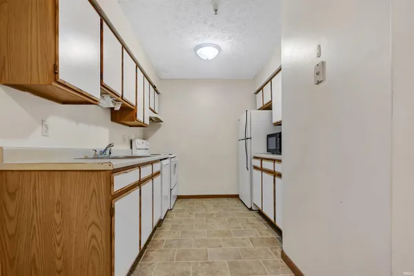$210,000 | 3230 John Hinkle Place, Unit D, Bloomington, IN 47408