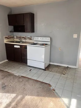 a utility room with washer and dryer