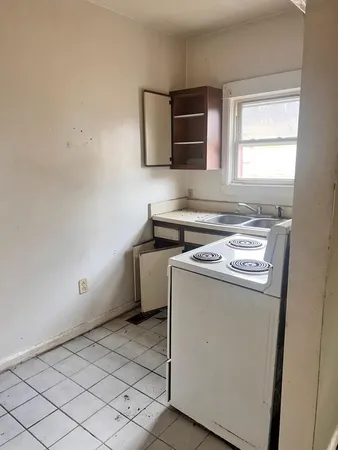 a utility room with washer and dryer