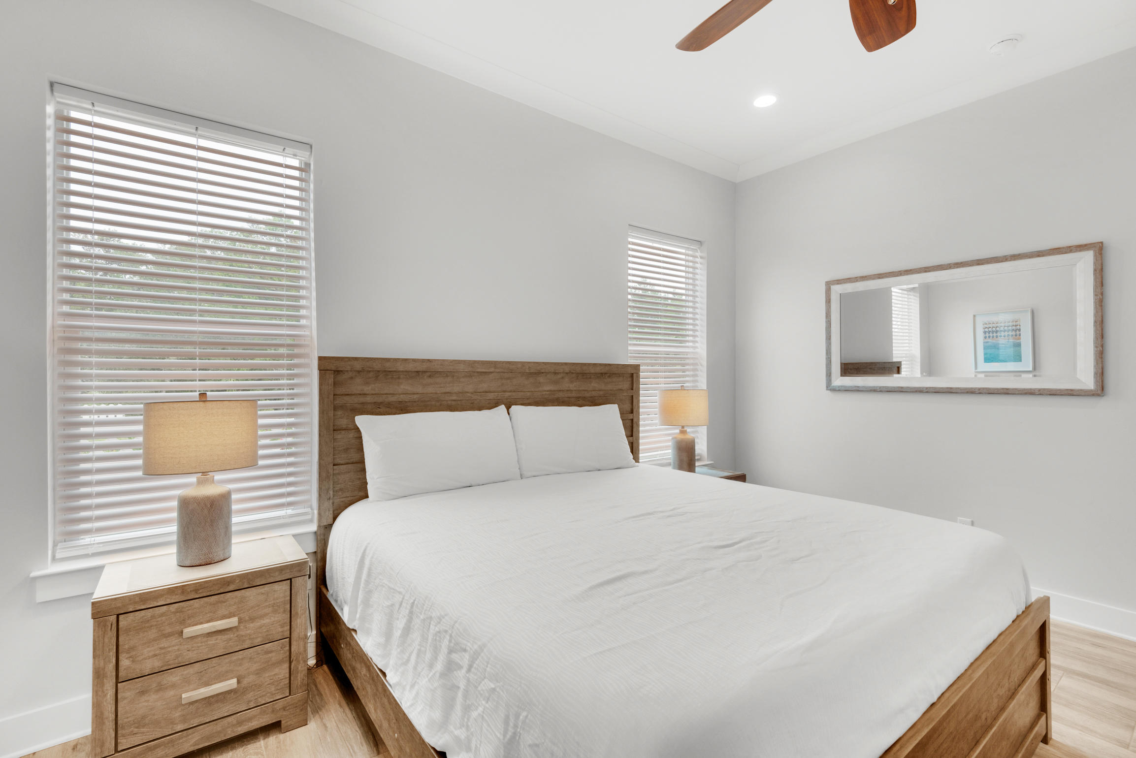 55 St Simon Circle Miramar Beach, FL 32550 - Photo 18 of 45 a bedroom with a bed and a night stand