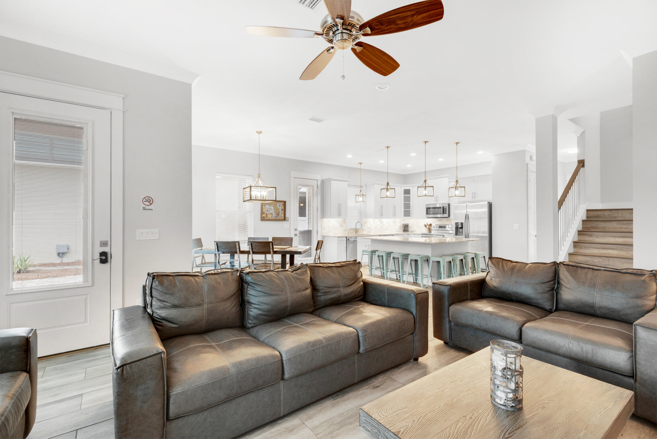 55 St Simon Circle Miramar Beach, FL 32550 - Photo 7 of 45 a living room with furniture and a view of kitchen