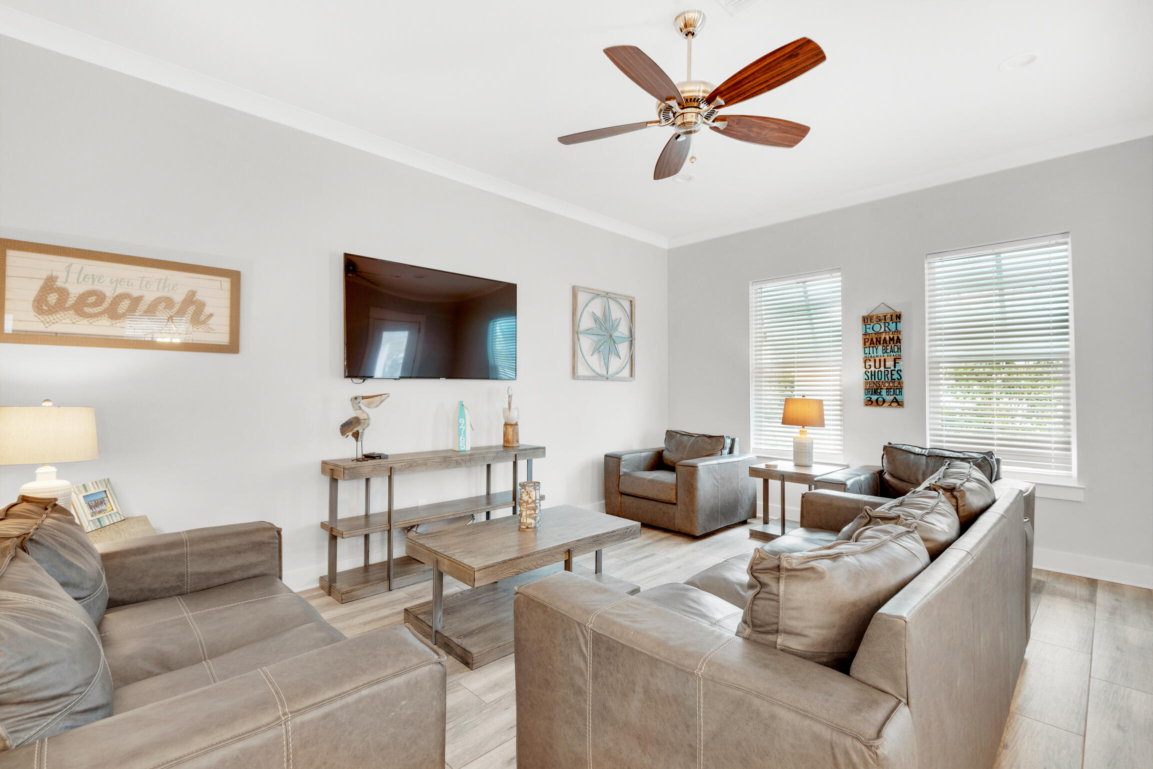 55 St Simon Circle Miramar Beach, FL 32550 - Photo 9 of 45 a living room with furniture and a large window