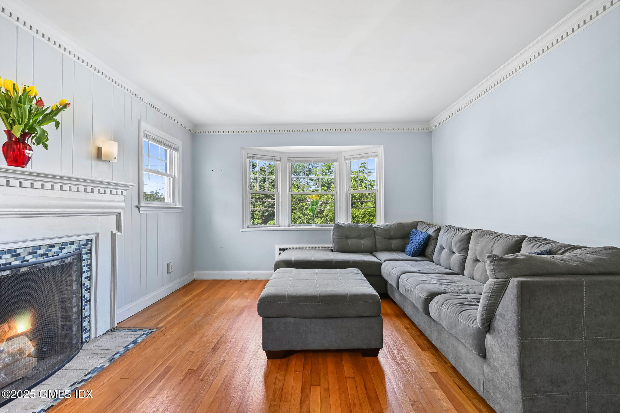 55 Byram Road Greenwich, CT 06830 - Photo 5 of 50 a living room with furniture and a fireplace