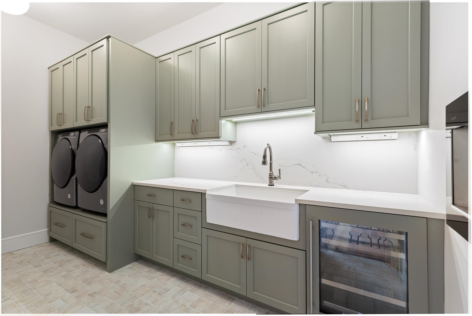 155 Settlement Drive Apex, NC 27523 - Photo 20 of 65 a kitchen with a sink cabinets and appliances