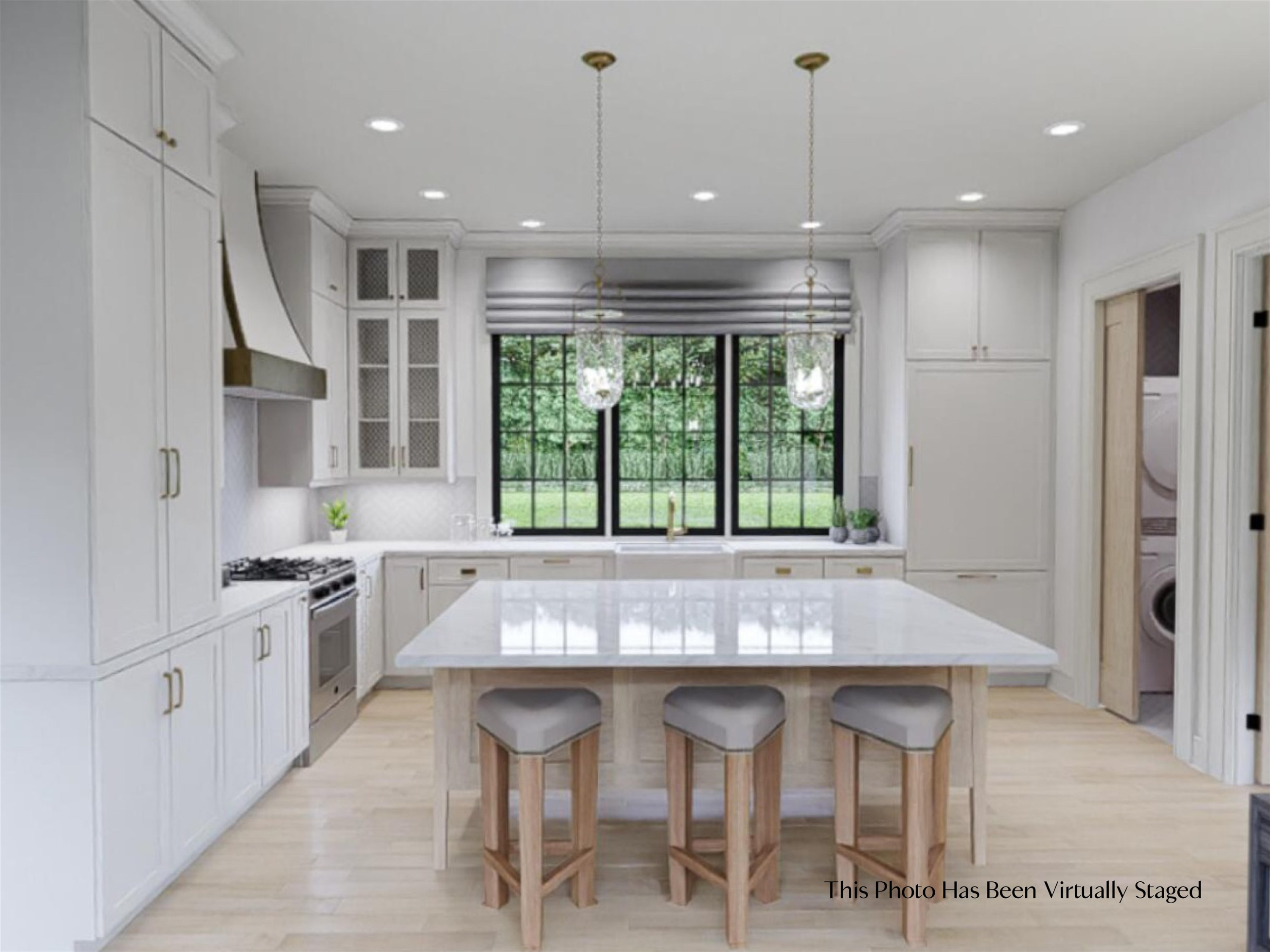 155 Settlement Drive Apex, NC 27523 - Photo 27 of 65 a kitchen with kitchen island granite countertop a table chairs sink and cabinets