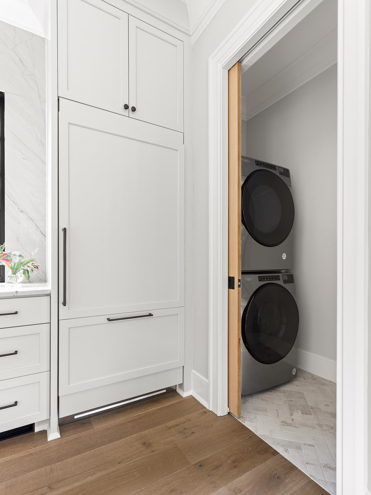 155 Settlement Drive Apex, NC 27523 - Photo 34 of 65 a view of a storage and utility room with washer and dryer