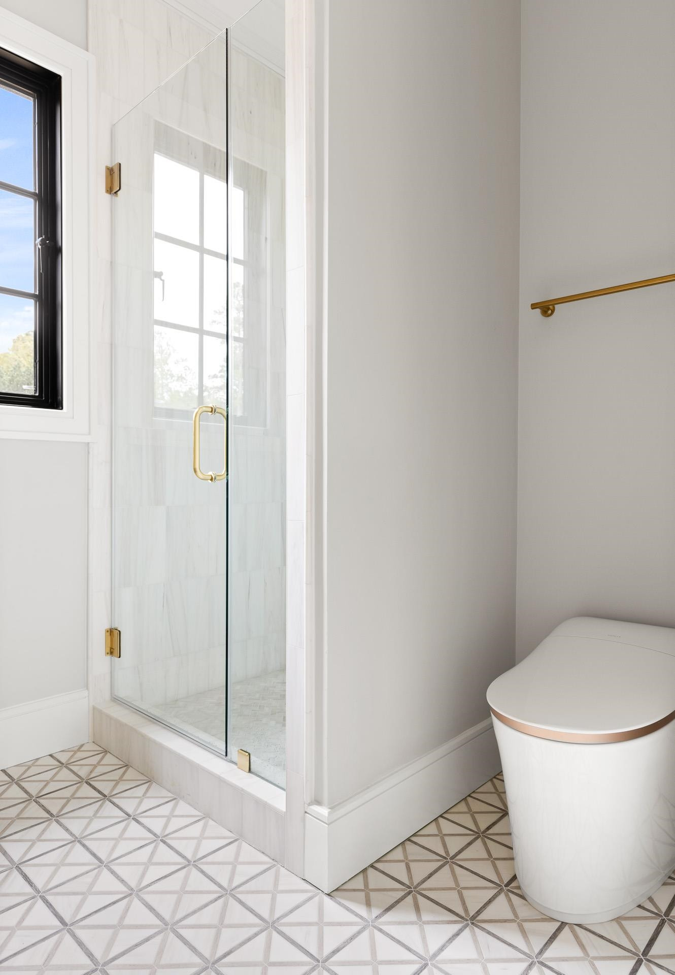 155 Settlement Drive Apex, NC 27523 - Photo 41 of 65 a bathroom with a granite countertop toilet and a shower