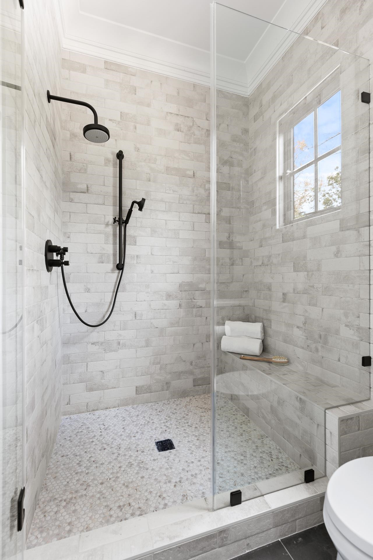 155 Settlement Drive Apex, NC 27523 - Photo 47 of 65 a bathroom with a shower