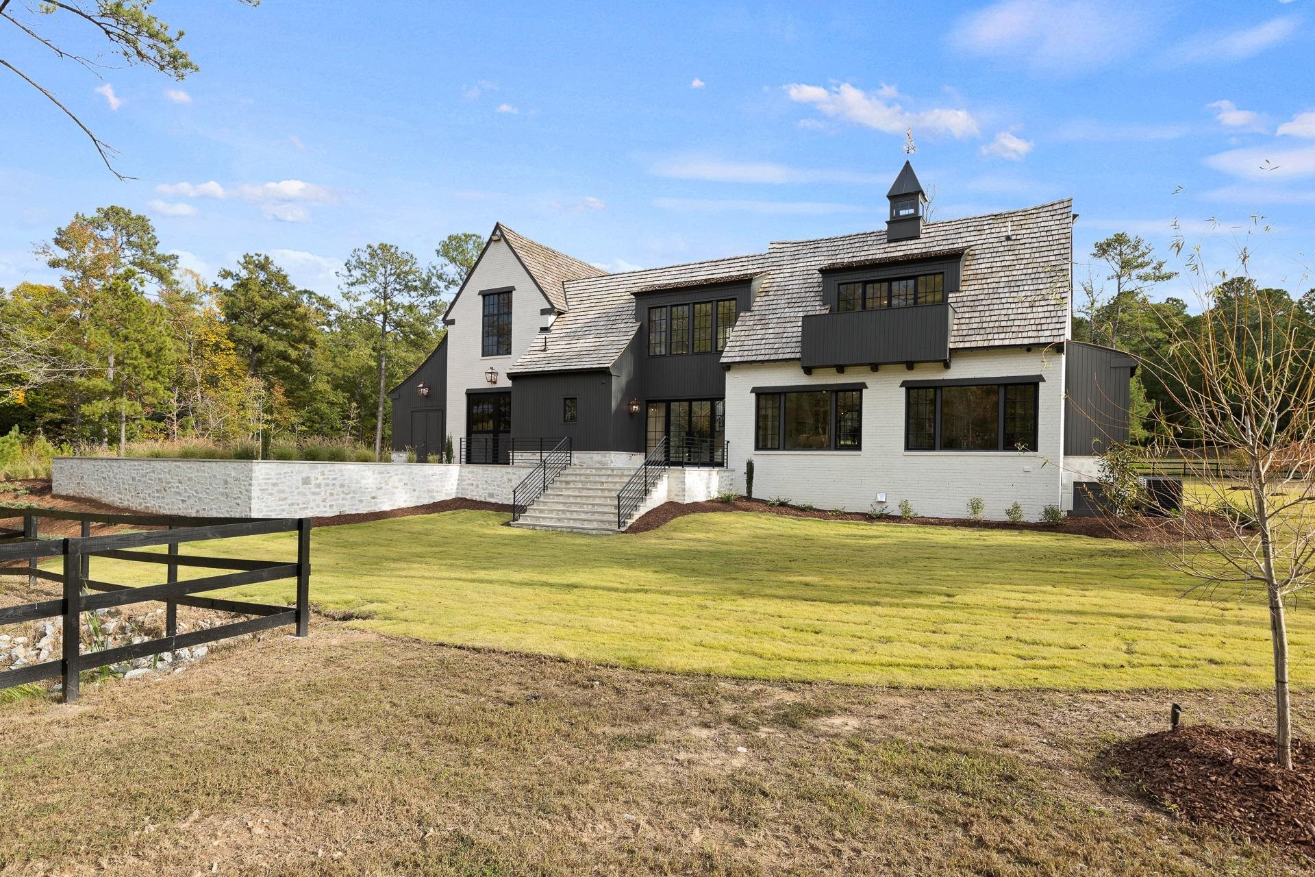 155 Settlement Drive Apex, NC 27523 - Photo 57 of 65 a view of a house with pool and chairs