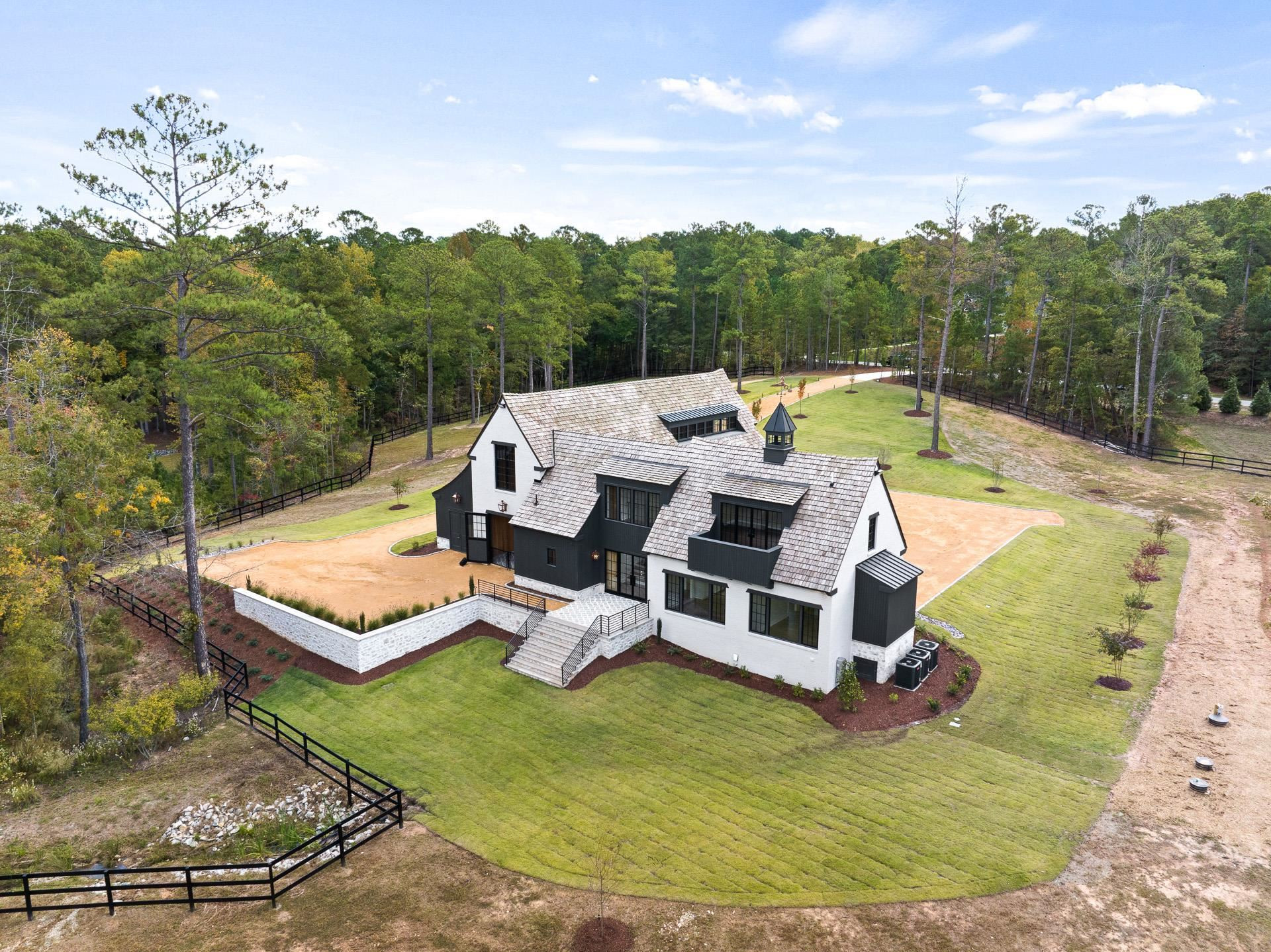 155 Settlement Drive Apex, NC 27523 - Photo 60 of 65 a view of a swimming pool with lounge chair