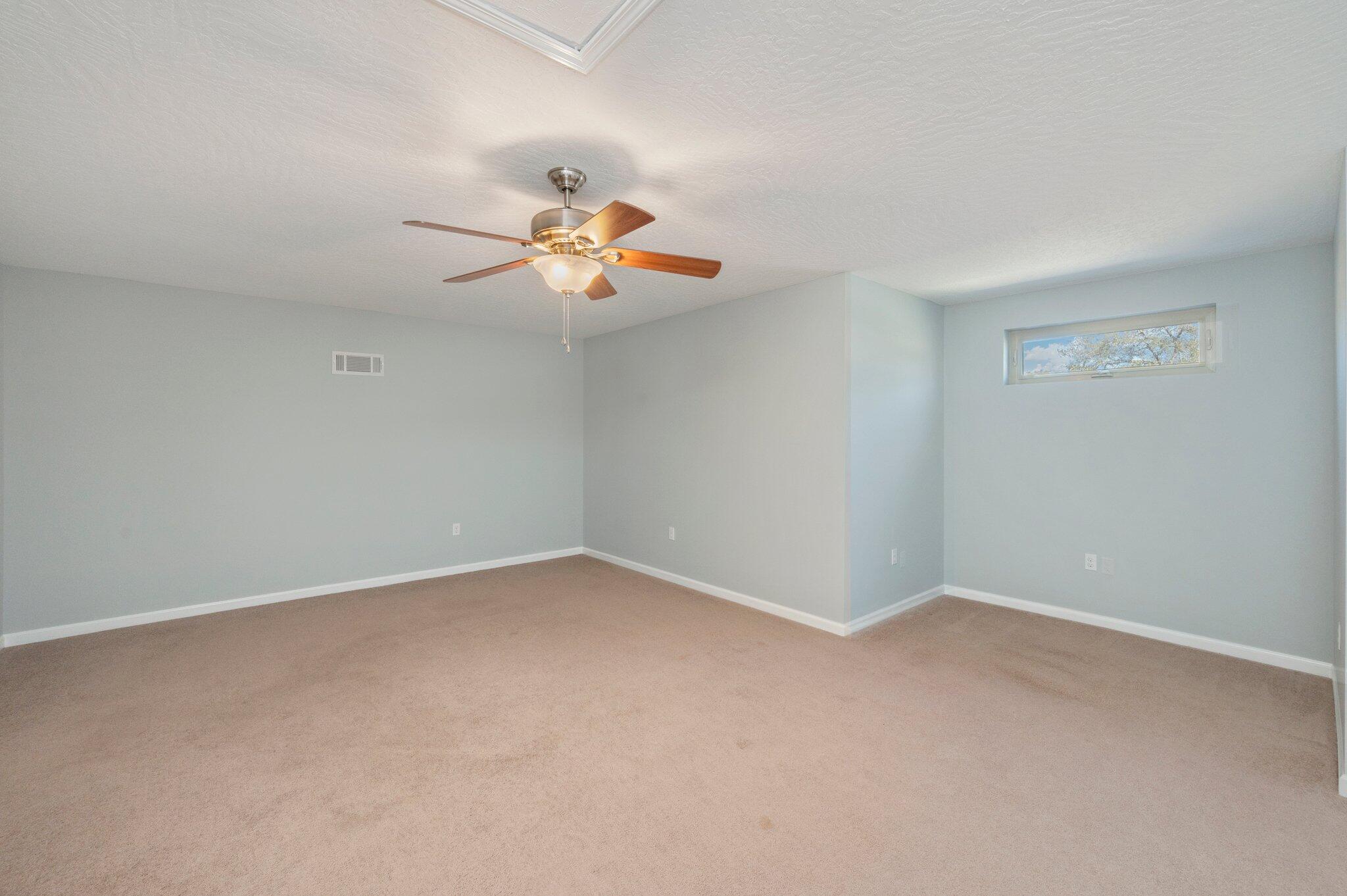 4623 Hermosa Road Crestview, FL 32539 - Photo 32 of 41 an empty room with a window