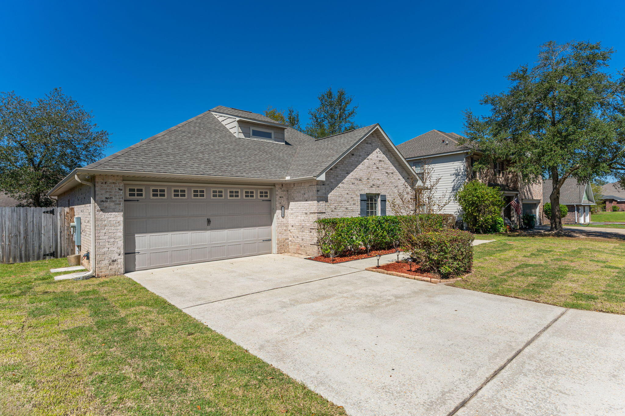 4623 Hermosa Road Crestview, FL 32539 - Photo 4 of 41 a front view of a house with a yard