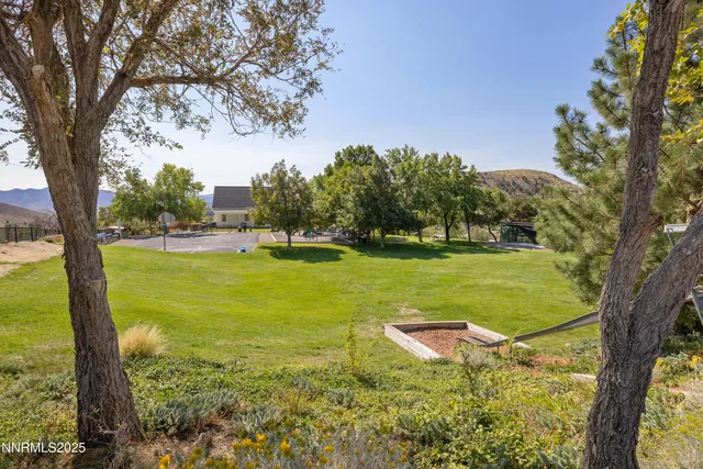 a view of a garden with an trees