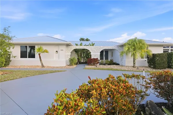 a front view of house with yard