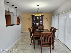 339 Landmark Street Marco Island, FL 34145 - Photo 13 of 18 a view of a dining room with furniture